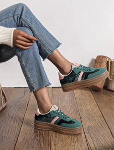 Green velvet trainers